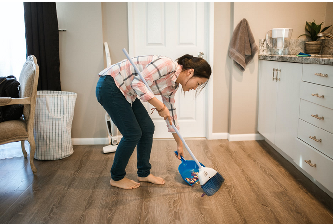 a maid cleaning the house